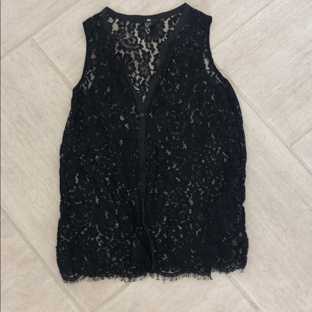 Sleeveless button down top
